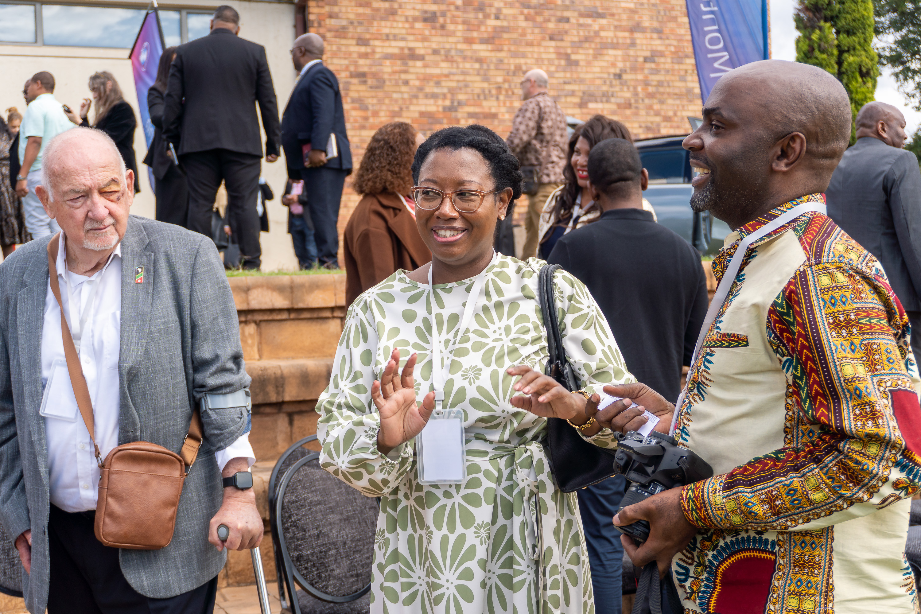 Diplomats and executives networking outdoors at CedarWoods of Sandton during the Ambassadors' and Executives Networking Luncheon 2026